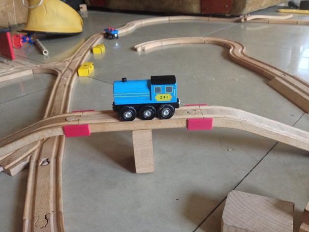 Train track bridge support clip